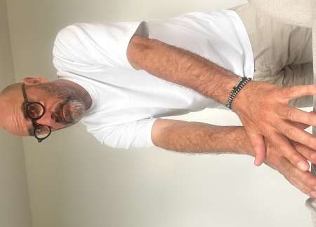 Photo de massage californien en duo sur table