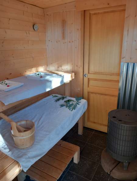 Photo de Sauna et massage dans la forêt
